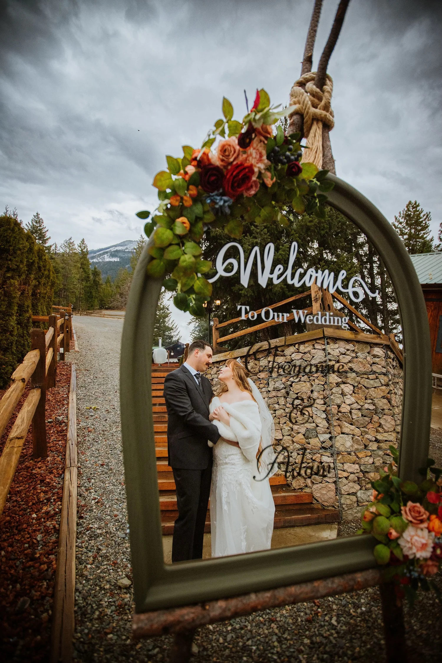 Couple at the floral arch